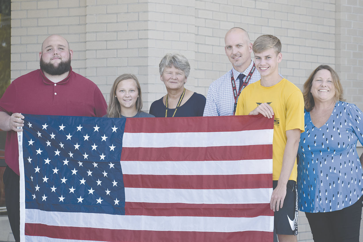 WOODMEN LIFE DONATES FLAGS TO MISD